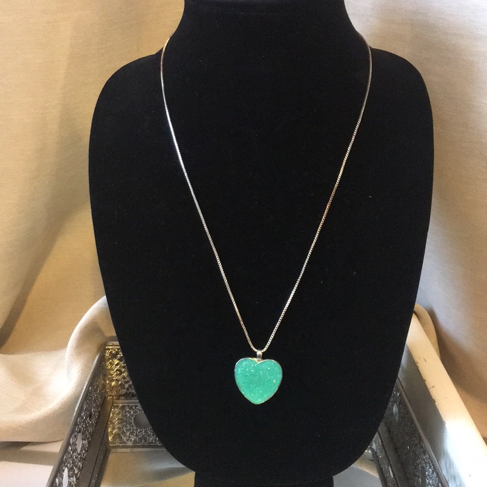 silver tone necklace with glitter pendent